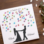 Personalisiertes Hochzeits-Gästebuch Leinwand 50x50 cm - Motiv Brautpaar Feuerwerk Classic - MADYES - Hochzeitsdeko Manufaktur