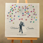 Personalisiertes Hochzeits-Gästebuch Leinwand 50x50 cm - Motiv Brautpaar Feuerwerk - MADYES - Hochzeitsdeko Manufaktur